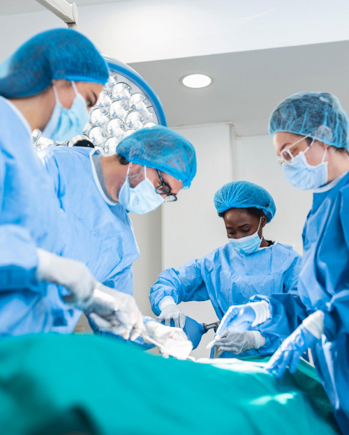 Doctor and assistant nurse operating for help patient from dangerous emergency case .Surgical instruments on the sterile table in the emergency operation room in the hospital.Health care and Medical